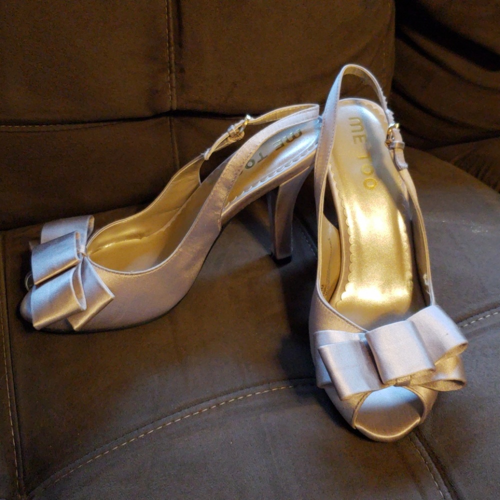 Gold sling back heels with bows